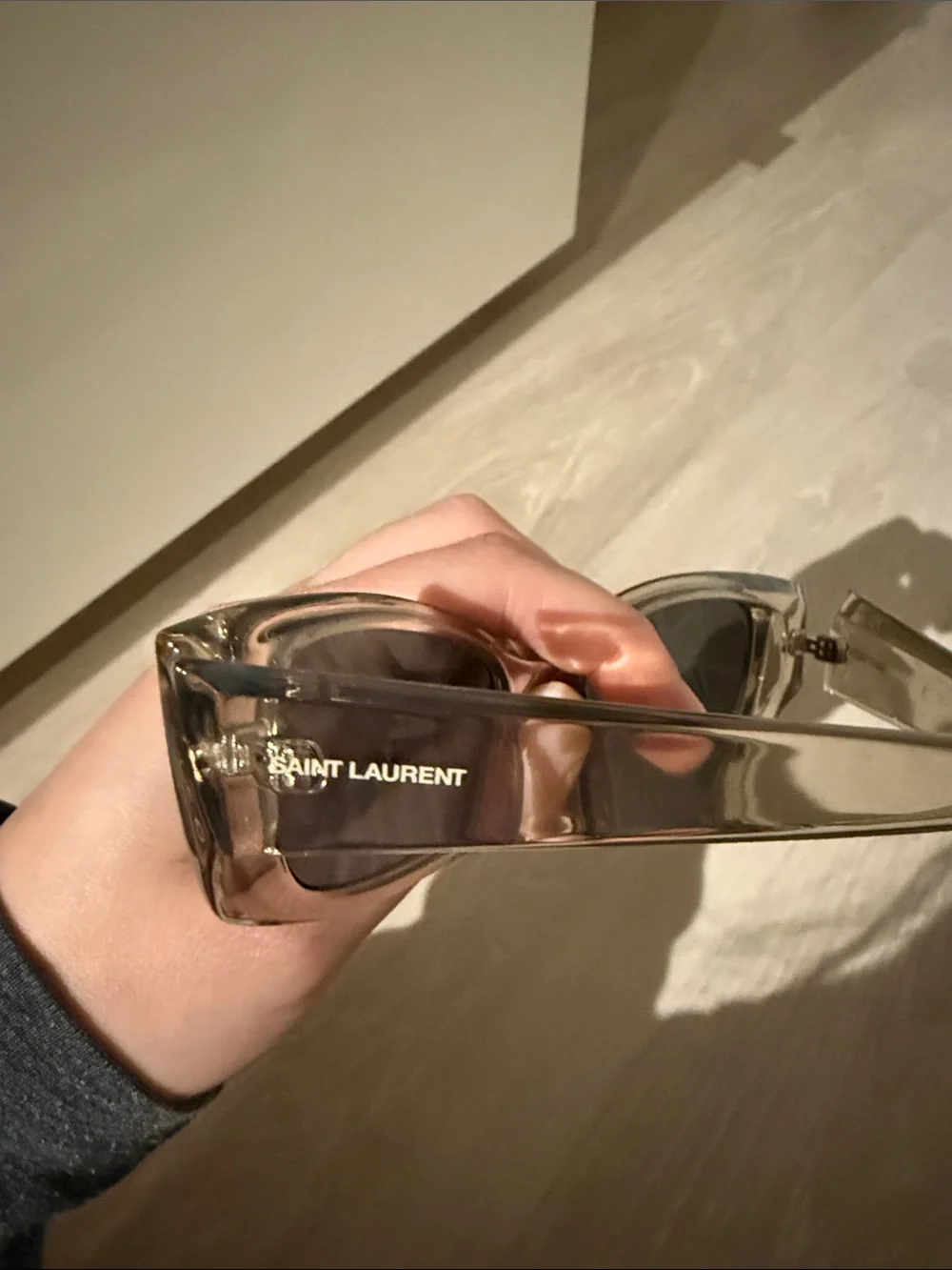 Saint Laurent Transparent Frame Sunglasses with Black Lenses